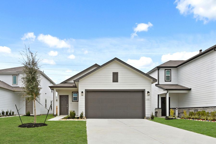 Front exterior of a new home in Barrett Crossing, Crosby, TX, highlighting curb appeal (Image 17).