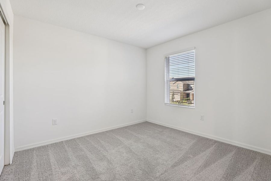 Spacious, unfurnished interior of a new home in Reserve at Forest Lake Townhomes, Lake Wales (Image 16).