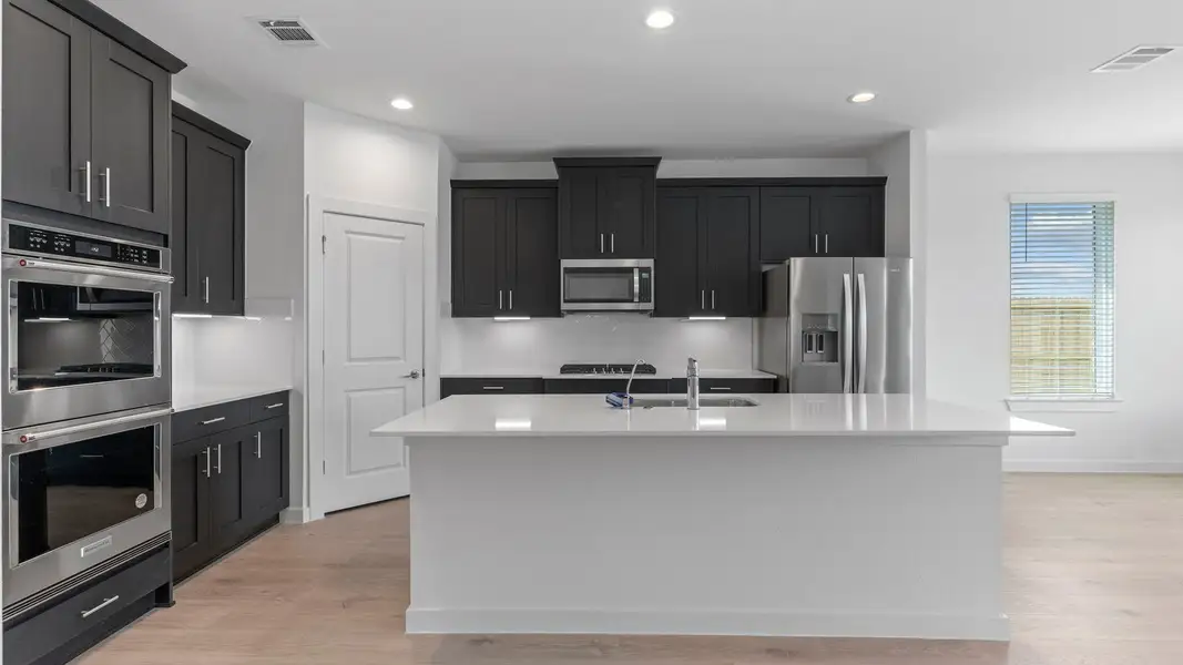 Furnished interior view inside a new home in Westland Ranch 60' Homesites, League City (Image 6).