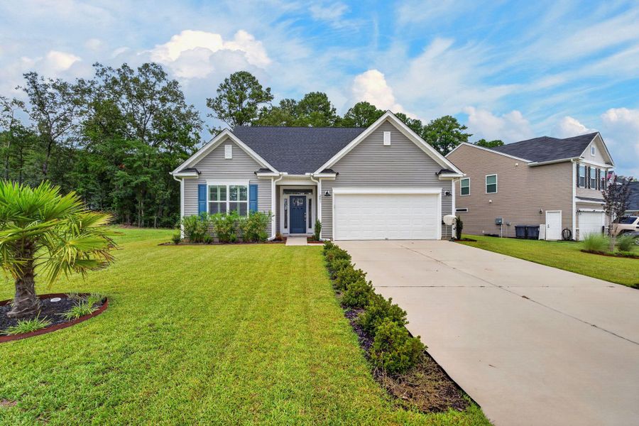Front exterior of a new home in , Ridgeville, SC, highlighting curb appeal (Image 25).