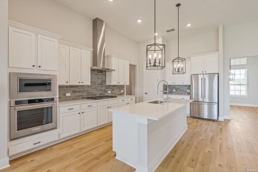 Furnished interior view inside a new home in Potranco West, Castroville (Image 3).