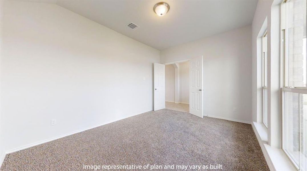 Unfurnished bedroom featuring carpet floors and baseboards Unfurnished bedroom featuring carpet floors and baseboards