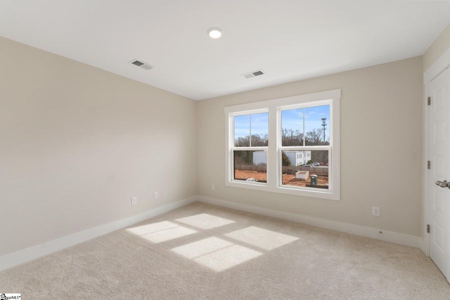 Spacious, unfurnished interior of a new home in Renaissance Place, Greenville (Image 16).