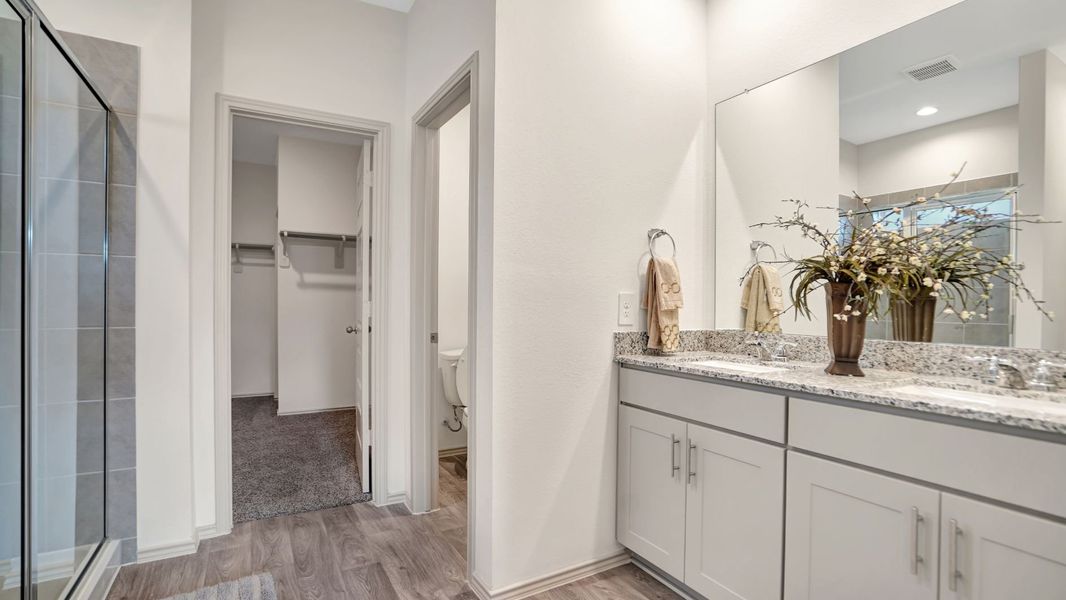 Representative furnished interior of a home built from the MITCHELL by D.R. Horton in Westward Pointe, Sealy (Image 20).