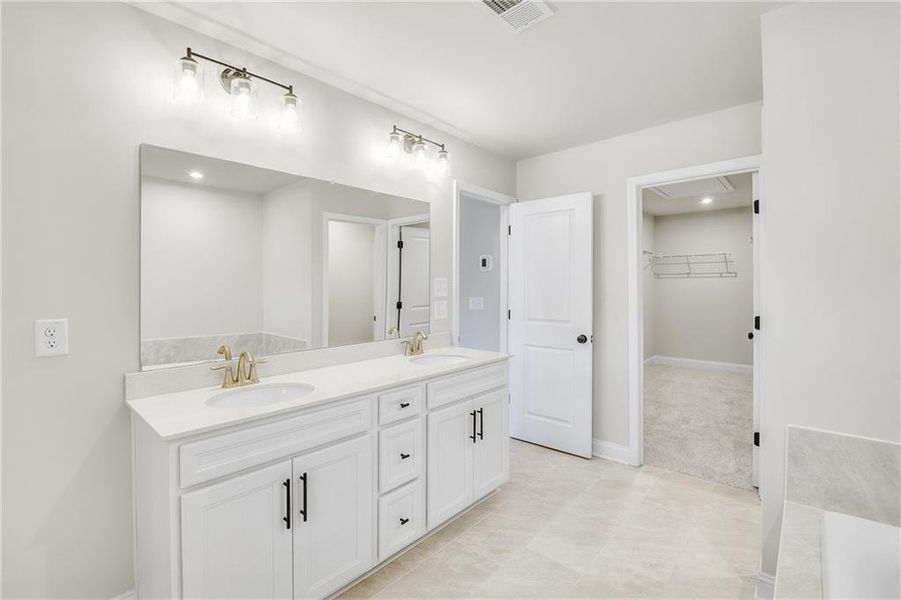 Furnished interior view inside a new home in Adler Springs, Powder Springs (Image 3). Furnished interior view inside a new home in Adler Springs, Powder Springs (Image 3).