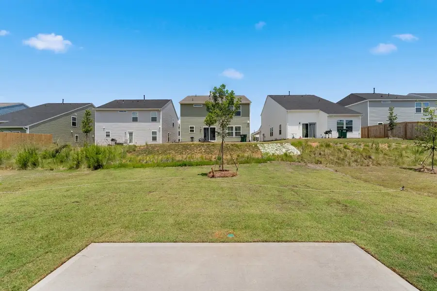 Front exterior of a new home in Braxton Place, Moore, SC, highlighting curb appeal (Image 2). Front exterior of a new home in Braxton Place, Moore, SC, highlighting curb appeal (Image 2).