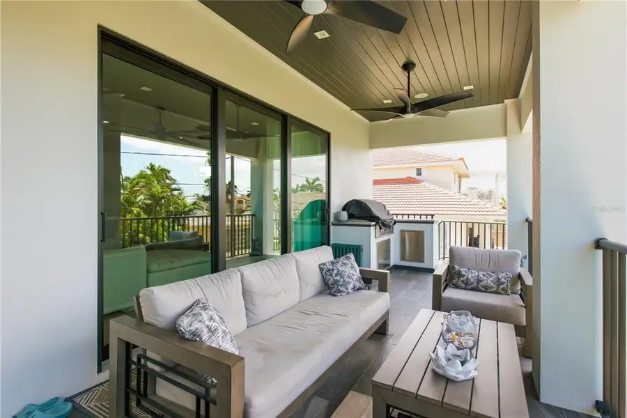 Exterior details and patio area of a home in , Belleair Beach (Image 33).