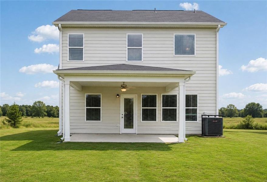 Exterior details and patio area of a home in Vickers Point - Single Family, Fairburn (Image 4).