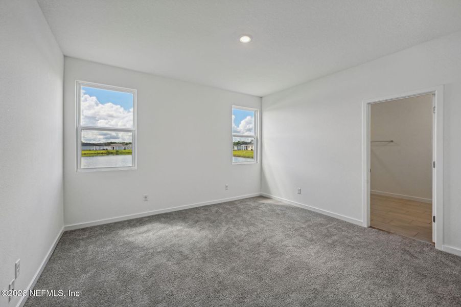 Spacious, unfurnished interior of a new home in Lakes at Bella Lago - Signature Series, Green Cove Springs (Image 29).