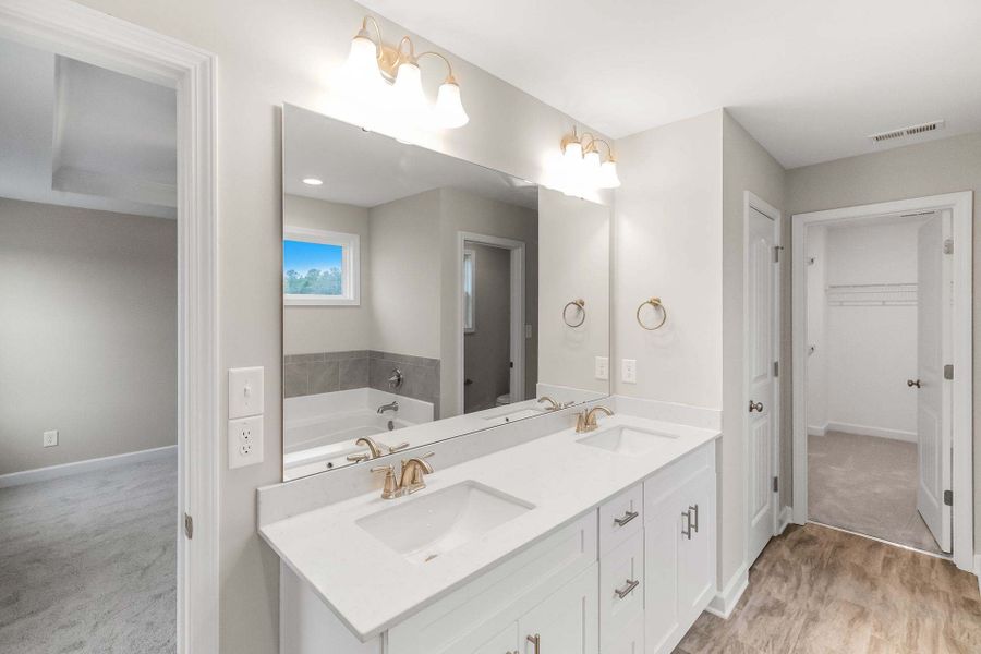 Representative furnished interior of a home built from the Aberdeen by Caviness & Cates Communities in Bartlett Manor, Youngsville (Image 181).