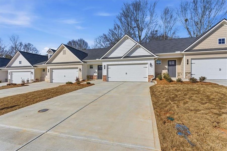 Front exterior of a new home in Silver Leaf, Dawsonville, GA, highlighting curb appeal (Image 23).