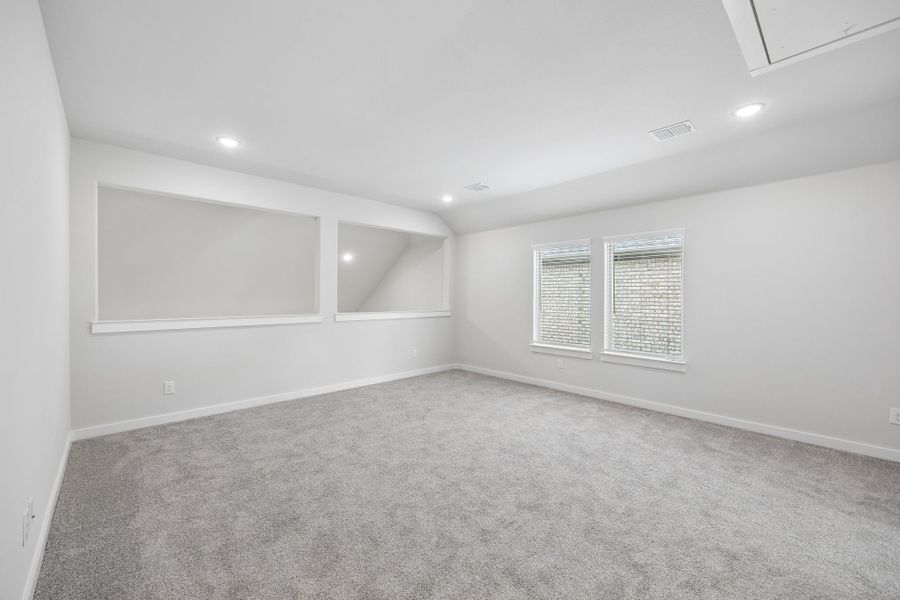 Game Room in the Winters home plan by Trophy Signature Homes – REPRESENTATIVE PHOTO