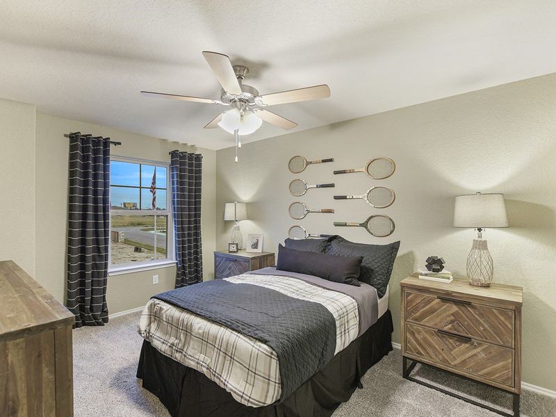 Secondary bedroom in the Santiago model at Hidden Springs in New Braunfels, TX by Century Communities