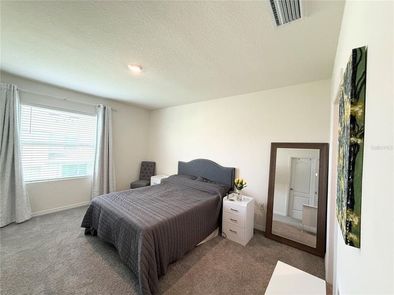 Furnished interior view inside a new home in , Kissimmee (Image 13).