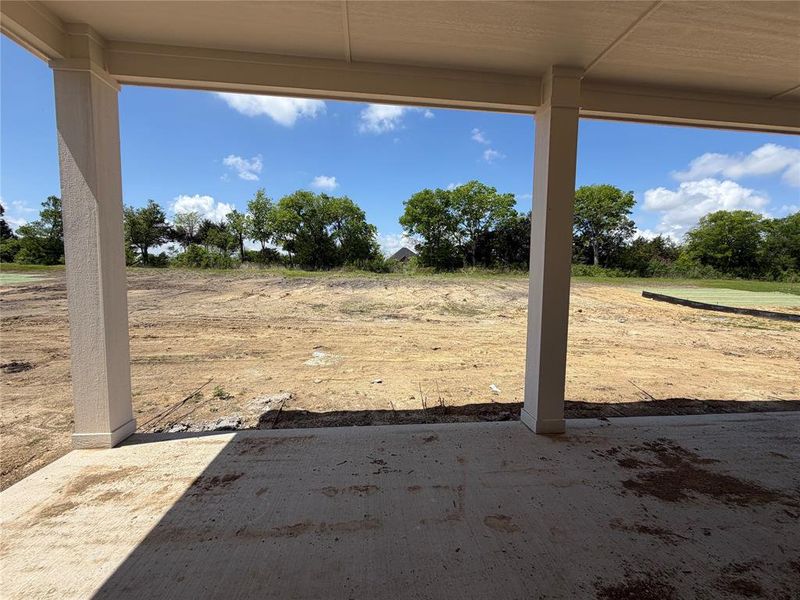 View of yard with a patio