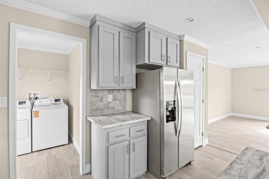 Furnished interior view inside a new home in , Okeechobee (Image 6).