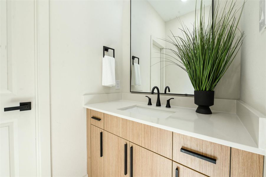 Secondary bathroom. Each with its own separate vanity