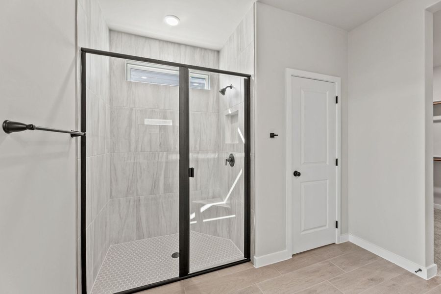 Representative furnished interior of a home built from the Tularosa by Hakes Brothers in Hickory Ridge, Elmendorf (Image 11).
