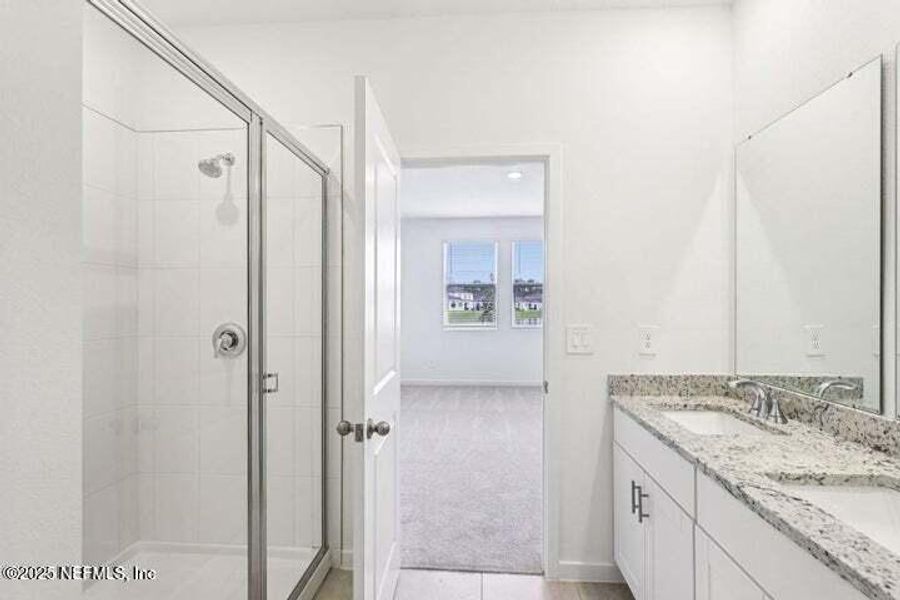 Furnished interior view inside a new home in Lakes at Bella Lago - Signature Series, Green Cove Springs (Image 16). Furnished interior view inside a new home in Lakes at Bella Lago - Signature Series, Green Cove Springs (Image 16).