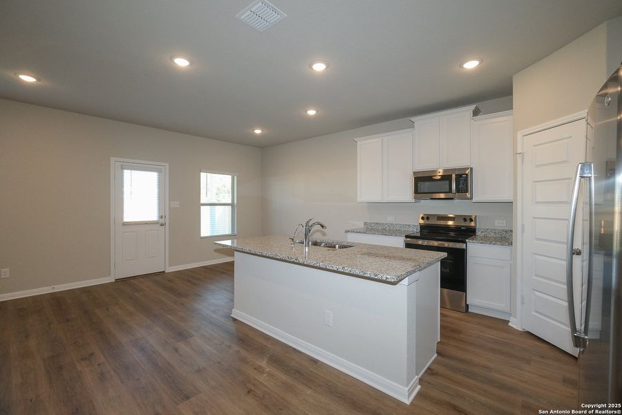 Furnished interior view inside a new home in Paloma Park, Converse (Image 6).