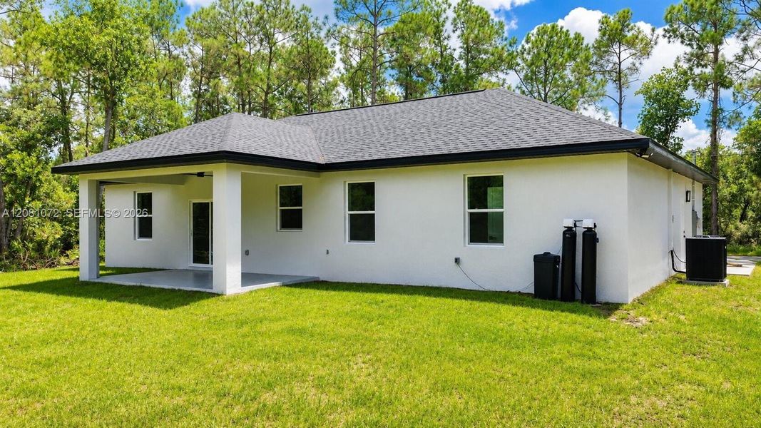 Exterior details and patio area of a home in , Sebring (Image 3).