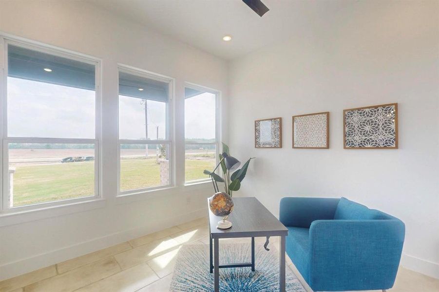Office space featuring light tile patterned floors, baseboards, and recessed lighting Office space featuring light tile patterned floors, baseboards, and recessed lighting
