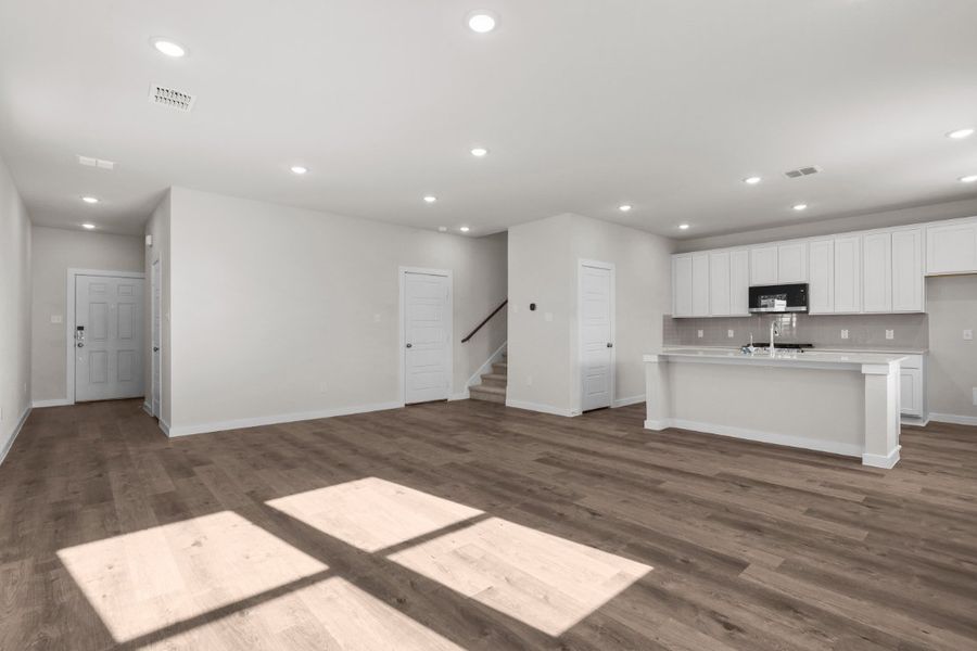 A large empty kitchen. A large empty kitchen.