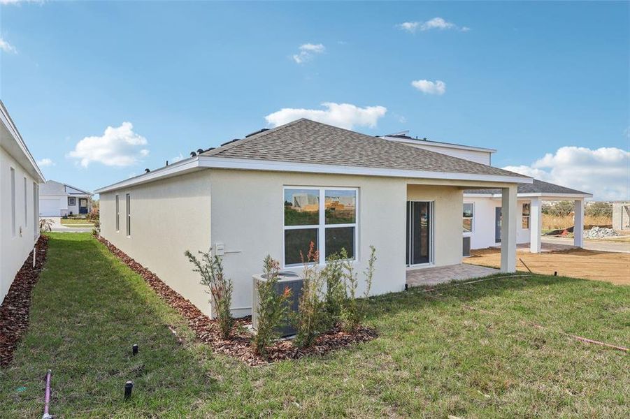 Exterior details and patio area of a home in Hamilton Bluff, Haines City (Image 3).