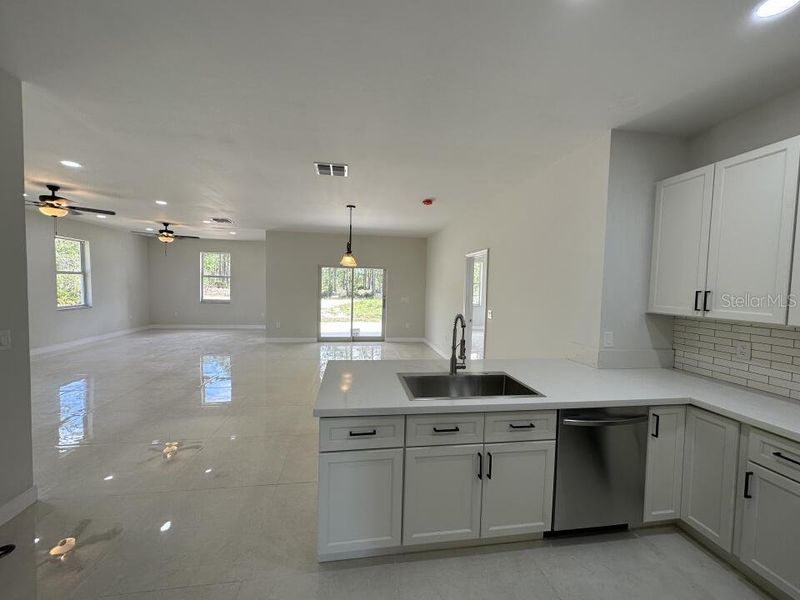 Furnished interior view inside a new home in , Indian Lake Estates (Image 10). Furnished interior view inside a new home in , Indian Lake Estates (Image 10).