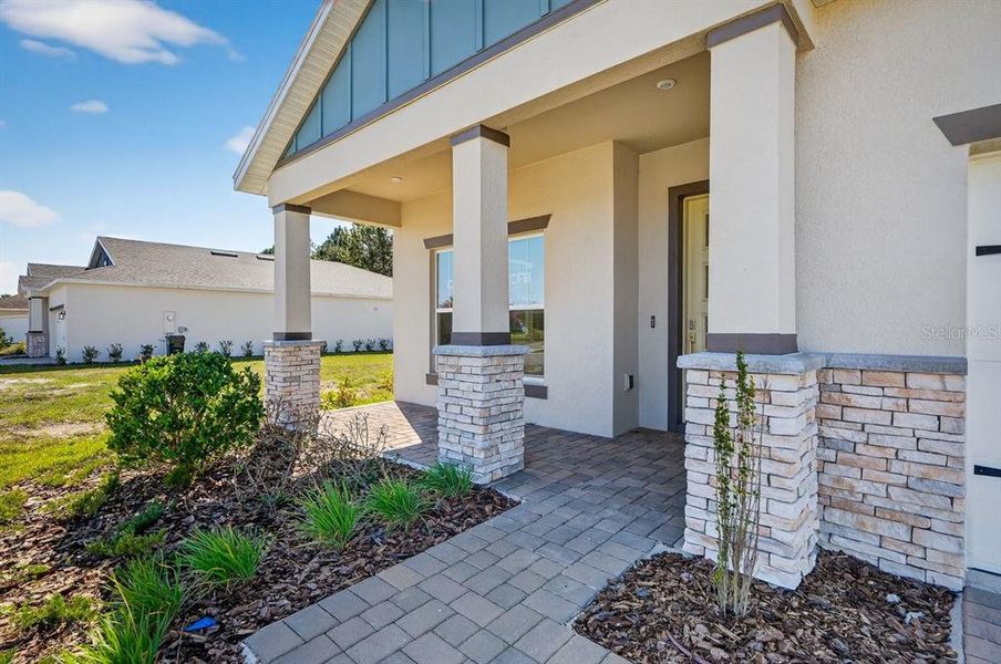 Exterior details and patio area of a home in Gray Hawk at Hole Two, Daytona Beach (Image 33).