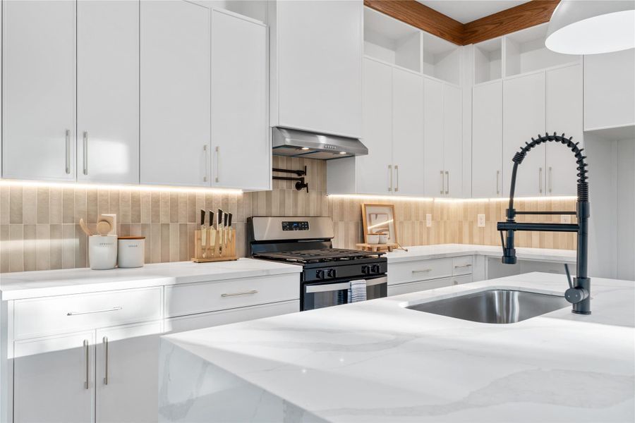 Sleek thin shaker style design in the cabinetry offers ample storage with soft-close drawers and stylish hardware. Sleek thin shaker style design in the cabinetry offers ample storage with soft-close drawers and stylish hardware.