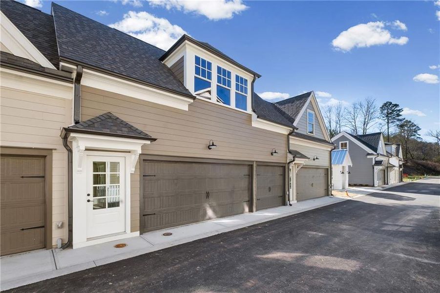 Front exterior of a new home in , Ball Ground, GA, highlighting curb appeal (Image 20). Front exterior of a new home in , Ball Ground, GA, highlighting curb appeal (Image 20).