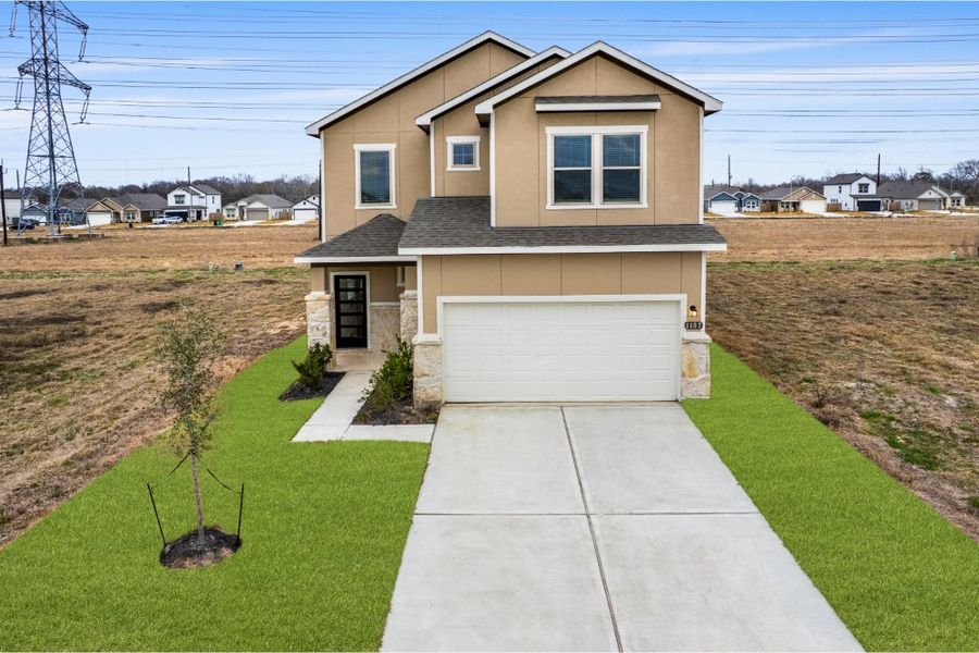 Front exterior of a new home in Glendale Lakes, Rosharon, TX, highlighting curb appeal (Image 30). Front exterior of a new home in Glendale Lakes, Rosharon, TX, highlighting curb appeal (Image 30).