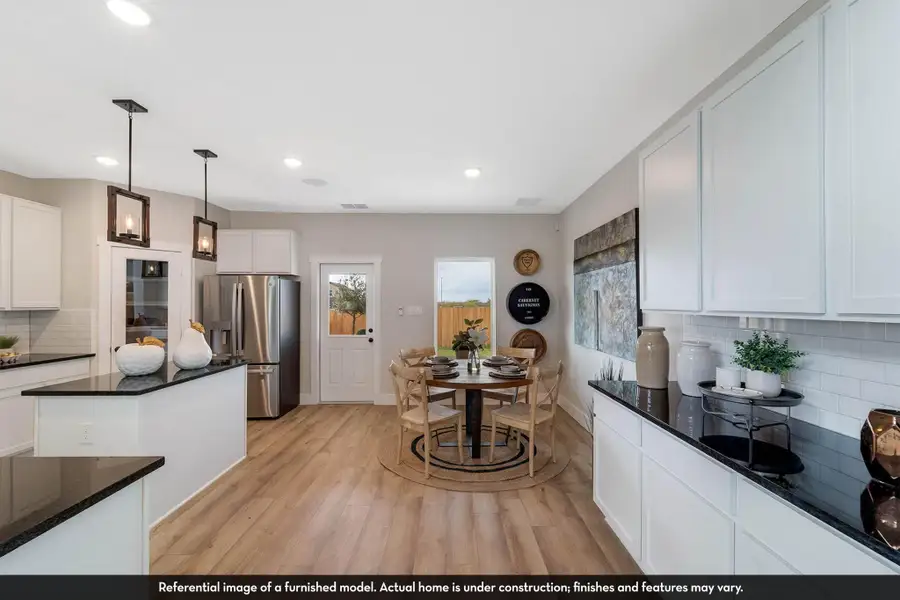 Furnished interior view inside a new home in Caney Mills, Conroe (Image 22).