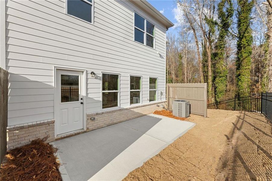 Exterior details and patio area of a home in Bluffs at Bells Ferry, Marietta (Image 16).