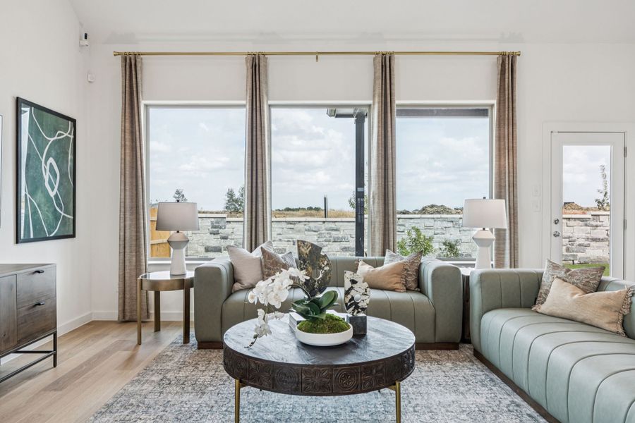 Living Room in the Trinity home plan by Trophy Signature Homes – REPRESENTATIVE PHOTO Living Room in the Trinity home plan by Trophy Signature Homes – REPRESENTATIVE PHOTO