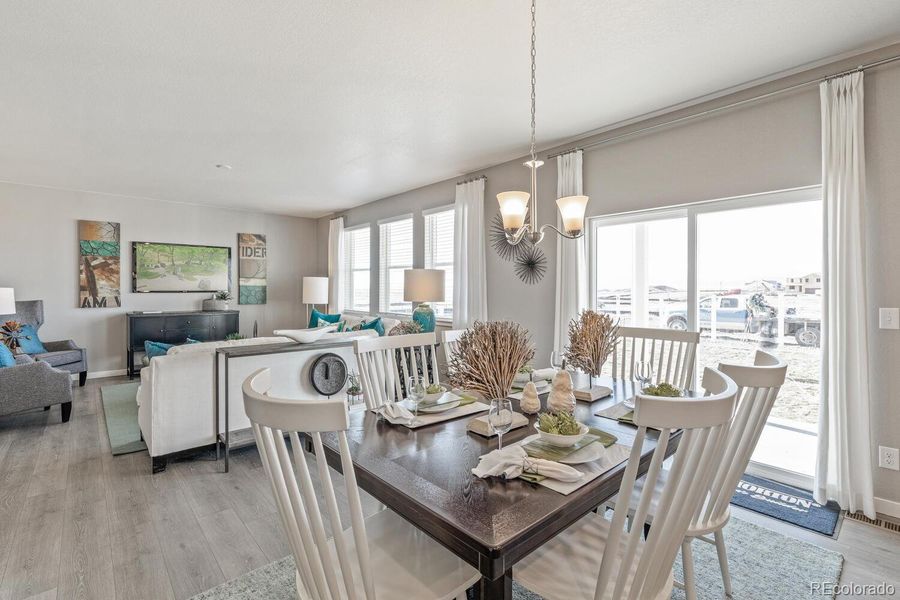 Furnished interior view inside a new home in Trails at Crowfoot, Parker (Image 11).
