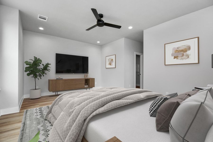 Spacious bedroom with modern finishes and abundant natural light. Clean, calming design creates a perfect retreat.