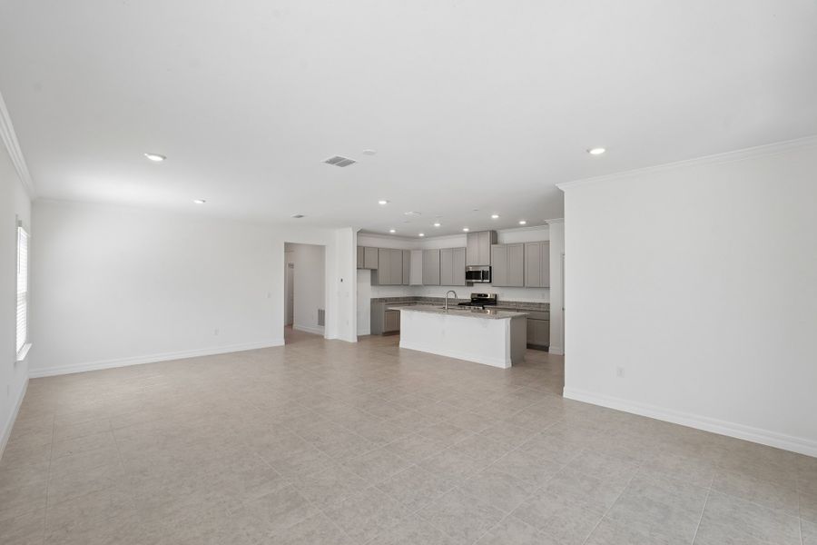 Spacious, unfurnished interior of a new home in Heritage Station, Punta Gorda (Image 46).