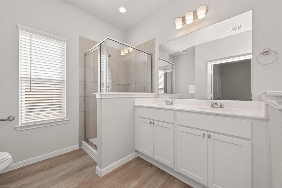 Furnished interior view inside a new home in Woodland Lakes, Huffman (Image 8).