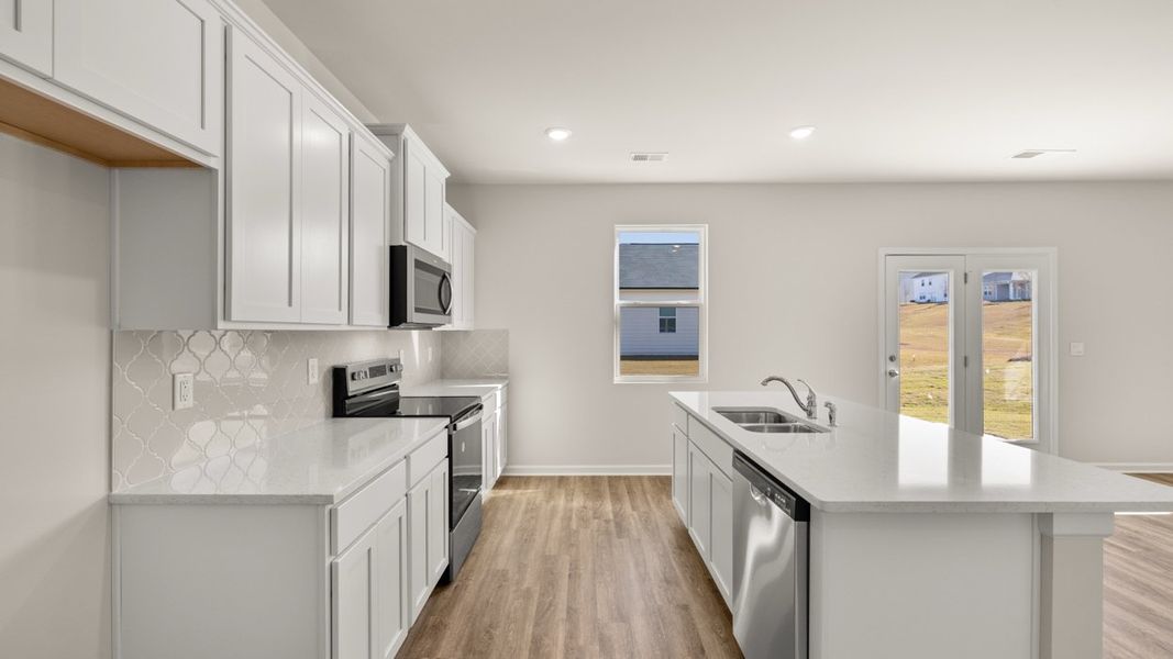 Representative furnished interior of a home built from the Galen by D.R. Horton in Fox Crossing, Griffin (Image 8).