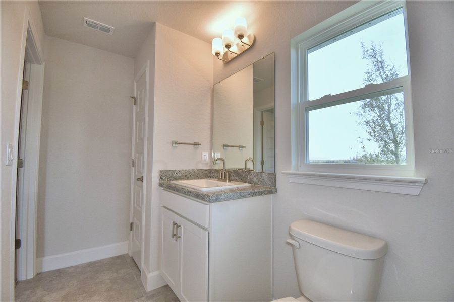Furnished interior view inside a new home in Cadence Crossing, Auburndale (Image 14).