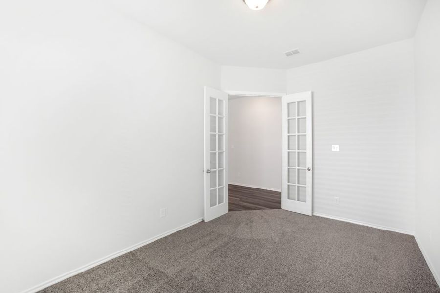 Representative exterior photo of a completed home built from the Bastrop by Impression Homes in Heartland, Heartland, TX (Image 16).