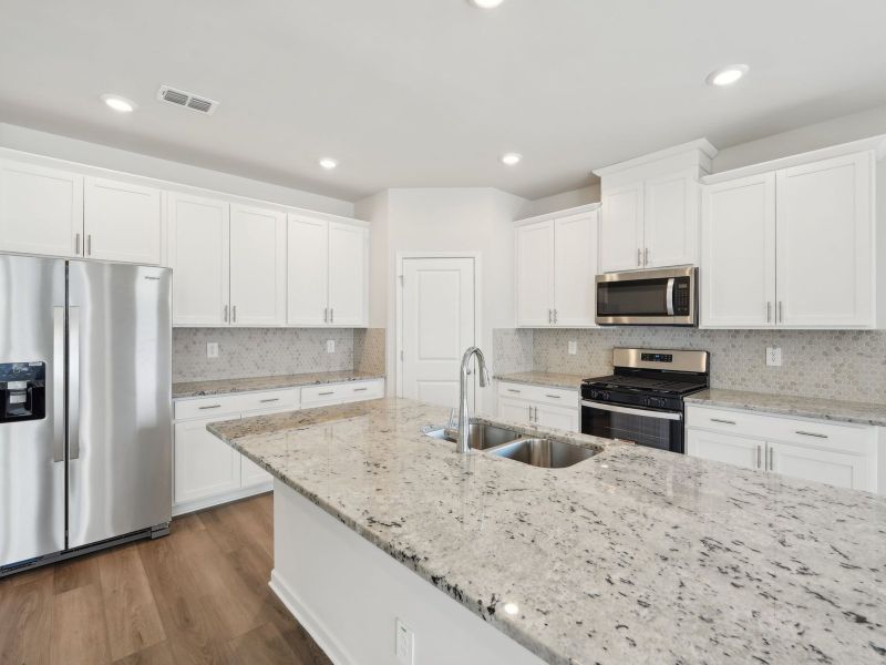 Furnished interior view inside a new home in Martin Springs - Estate Series, Lawrenceville (Image 7).
