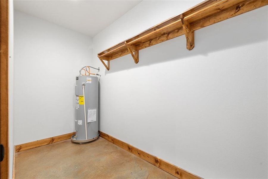 Master closet with water heater Master closet with water heater
