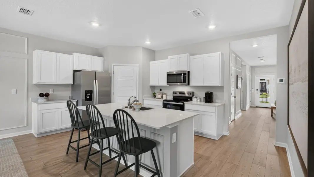 Furnished interior view inside a new home in American Village, Palm Coast (Image 6).