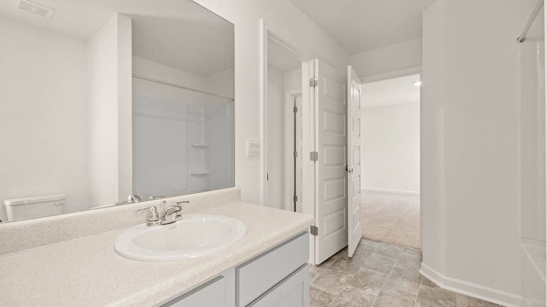 Representative furnished interior of a home built from the Packard by D.R. Horton in Evergreen Crossing, Locust Grove (Image 13).