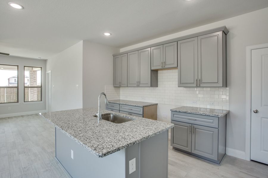 Image 2 representing the Ariel by Megatel Homes in Manors at Woodbridge, Wylie, TX. Image 2 representing the Ariel by Megatel Homes in Manors at Woodbridge, Wylie, TX.