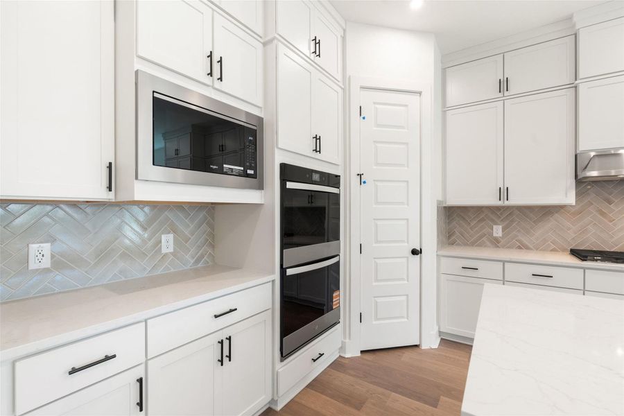 Furnished interior view inside a new home in Persimmon, Buda (Image 13).