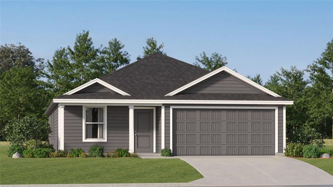 View of front of home featuring a front yard and a garage